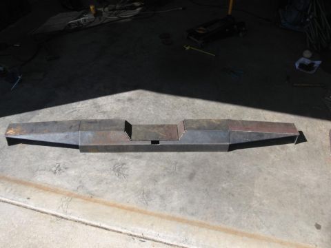 1995 Ford F-150 - Unfinished custom steel bumper fabricated from multiple metal sections, shown on a garage floor.