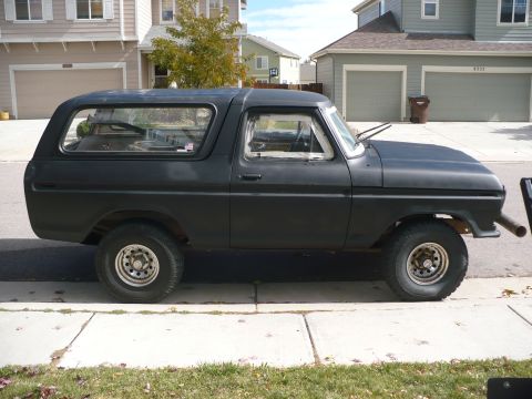1979 Ford Bronco - This matte black Ford Bronco appears to be from the late 1970s, likely a 1978 model, based on its body style.