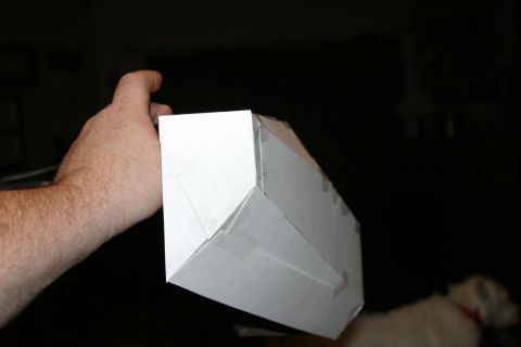 1987 Suzuki Samurai - Cardboard mock-up of a car bumper, held by a hand.
