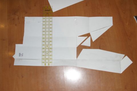 1987 Suzuki Samurai - Paper template pieces and a quilting ruler are laid out on a wooden surface.