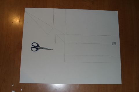 1987 Suzuki Samurai - A diagram is drawn on a large sheet of paper, with scissors placed on top.