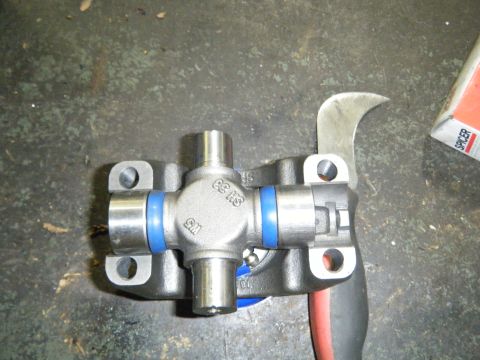 1978 Ford Bronco - A universal joint with blue seals and GM markings is shown, possibly for a vehicle modification.