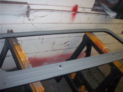 1978 Jeep CJ5 - Primed Jeep CJ5 windshield frame on sawhorses, ready for paint.