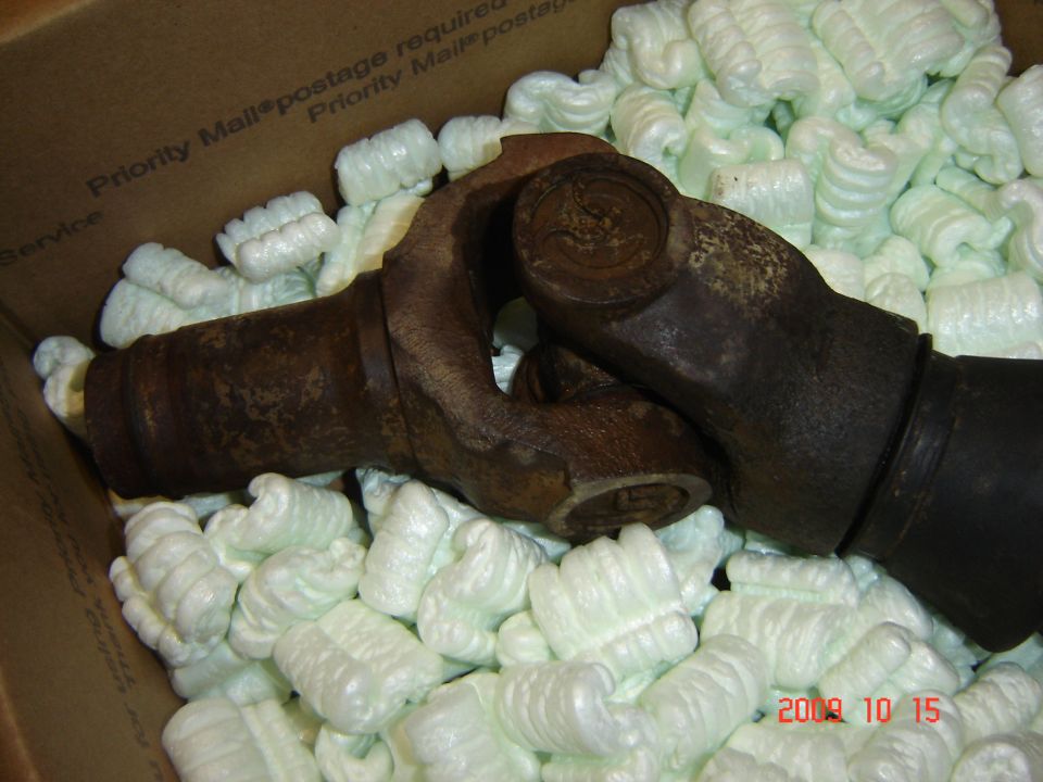 Driveshaft U-joints in packing peanuts