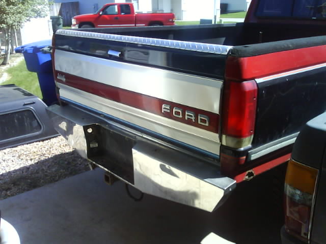 1990 Ford F-350 rear tailgate with red and white stripe