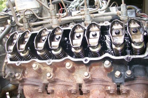 1992 Ford C-350 (Centurion Conversions) - Close-up view of an engine's valve train, showing rocker arms and valve springs.