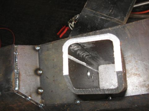 1995 Ford F-150 - Close-up of a custom-welded steel frame component, likely for a vehicle modification.