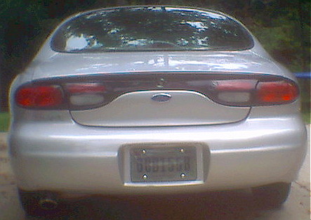 1997 Ford Taurus - I switched my mom's taillights and mine, so now mine are red. it looks a hell of alot better.