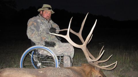 1983 Jeep CJ7 - Hunter poses with impressive elk antlers after a successful hunt.
