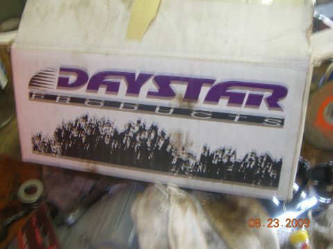 1991 Ford F-150 - A box with the Daystar Products logo is visible, along with other items in the background.