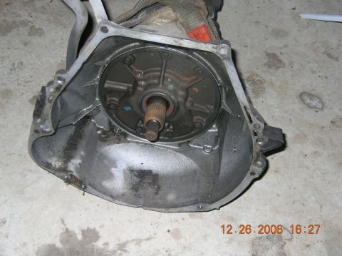 1991 Ford F-150 - A transmission torque converter housing is shown with its internal pump and splined shaft visible.