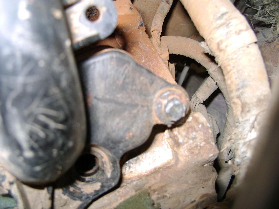 Engine part with bolt and wiring