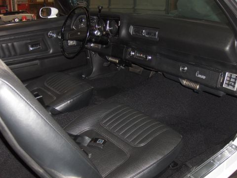 1970 Chevrolet Camaro - Interior view of a 1970 Chevrolet Camaro, showing the seats, dashboard, and center console.