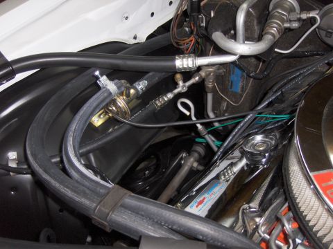 1970 Chevrolet Camaro - Detail shot of engine bay with various hoses and components visible, including a tag indicating Chevrolet Performance.
