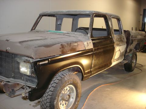 1979 Ford F-250 - This 1979 Ford F-250 Crewcab is in the process of being restored, with visible primer and body filler.