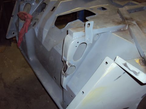 1948 Jeep Wrangler - This image shows a vehicle body part, possibly from a Jeep, during a restoration process. The Supermotors logo is visible in the lower righ…