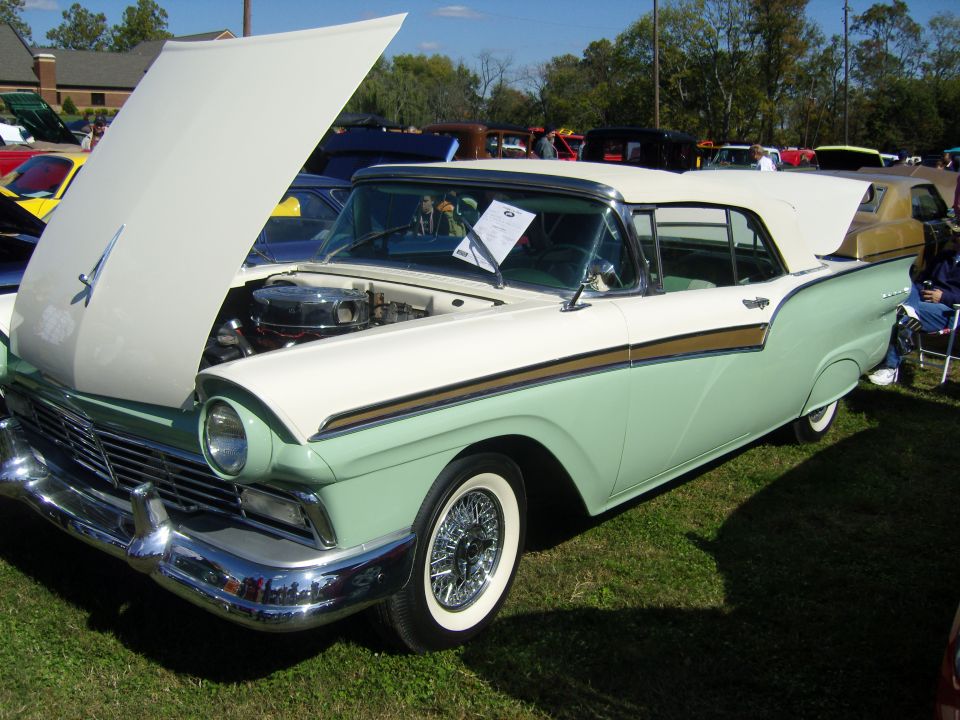 1957 Ford Fairlane 500 convertible with hood open, two-tone paint