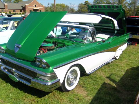 2007 Ford Mustang - This 1957 Ford Fairlane convertible is displayed with its hood and trunk open.