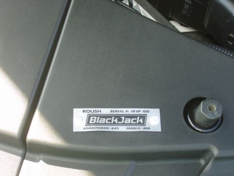 2007 Ford Mustang - Close-up of the engine bay showing the Roush BlackJack serial number plate, indicating serial number 19 out of 100 produced.