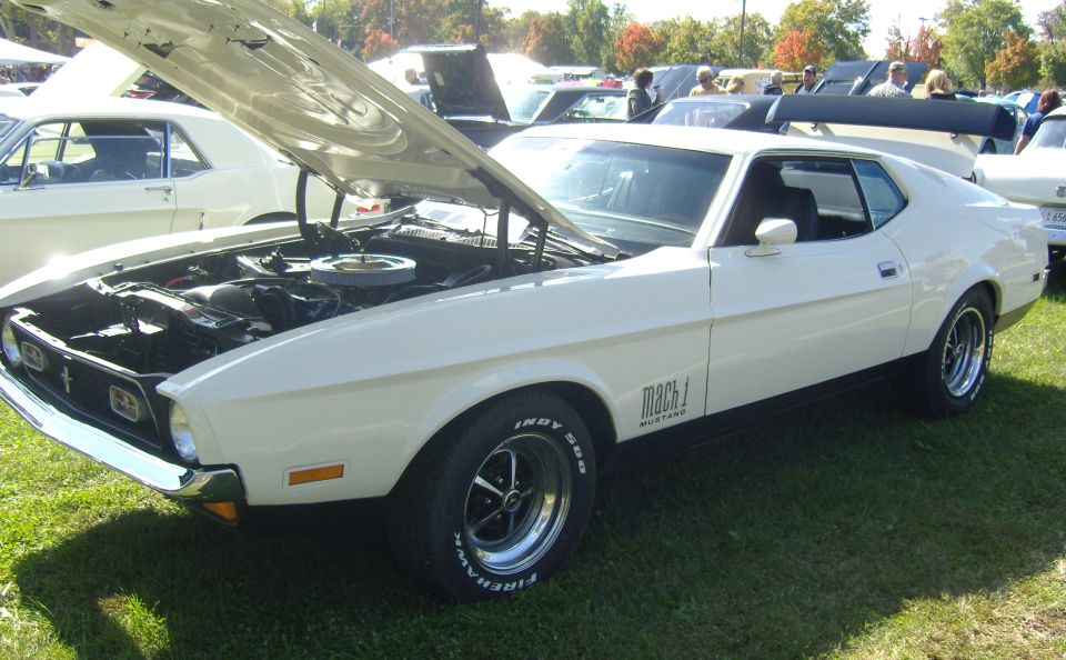 White 1971 Ford Mustang Mach 1 with hood open, showing engine