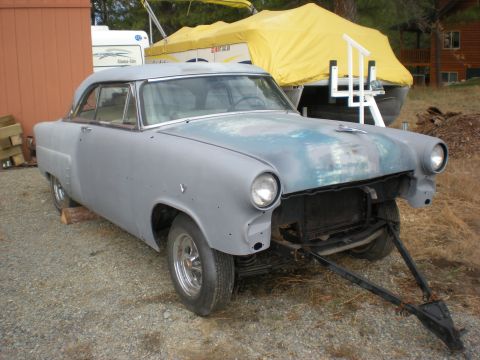 1974 Ford Ranchero - This coupe body, likely from the 1950s, is in primer and missing its front grille.