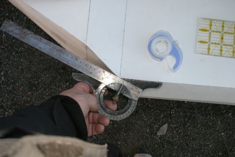 1987 Suzuki Samurai - Using measuring tools to mark wood for a project.
