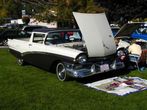 1967 Ford Ranchero - This two-tone brown and white 1957 Ford Ranchero is displayed with its hood open at an outdoor event.
