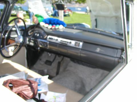 1967 Ford Ranchero - The interior of a vintage car is shown, a dashboard with a radio and vents, and a steering wheel.