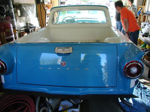 1967 Ford Ranchero - Rear view of a 1957 Ford Ranchero, showing the tailgate and bed.