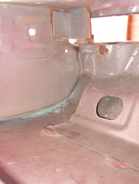 1983 Ford Bronco - The factory side reinforcing plate is boxed in the front corner, and the rear reinforcement is spot-welded onto it, beside the slot for the…