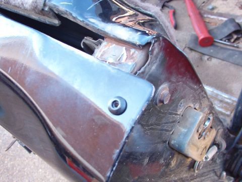 1983 Ford Bronco - This heavy black pop rivet should provide enough strength to do the main repair. When the t/g is closed, this rivet will be hidden under th…