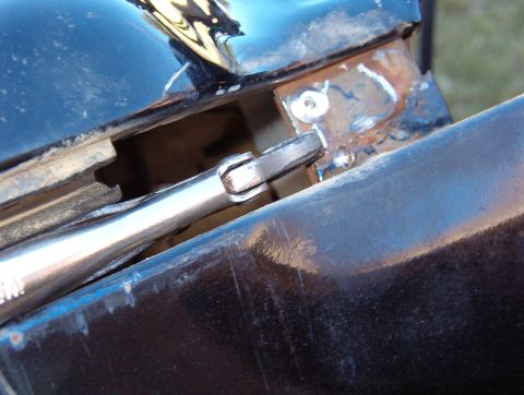1983 Ford Bronco - With vise-grips holding it up, I drilled & riveted the side reinforcement to the new brace. I used three 3/16" rivets here, as before.