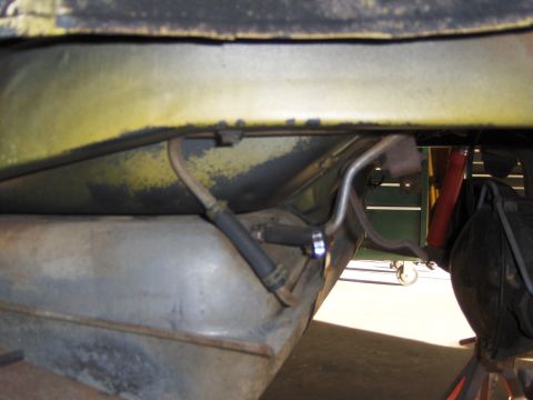 1971 Chevrolet Camaro - Close-up view of the fuel tank and lines on the underbody of a 1971 Chevrolet Camaro.