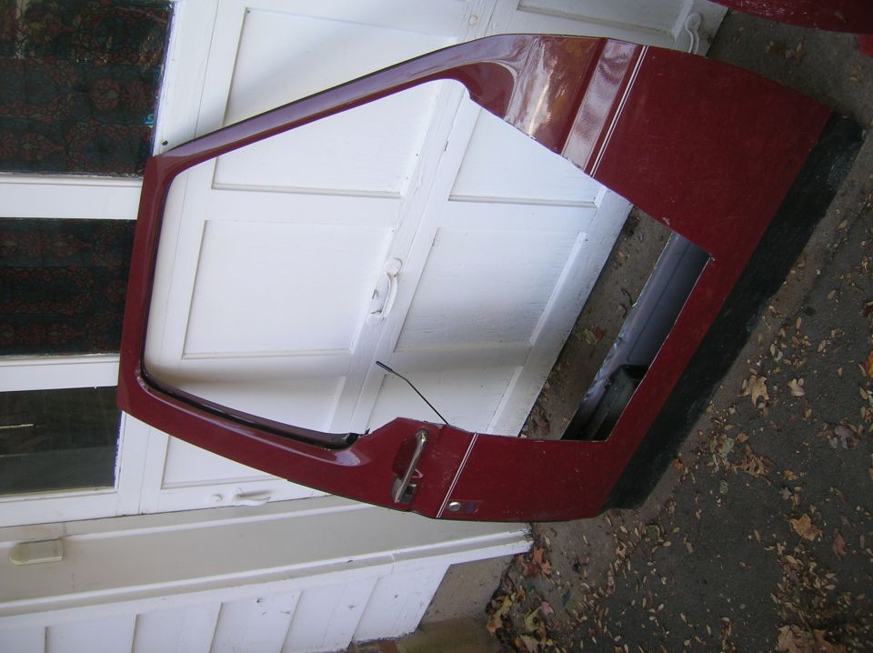 Red half door with chrome handle and trim