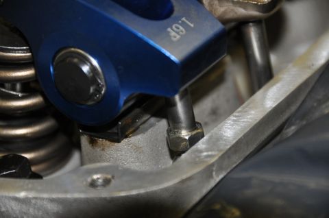 1996 Ford Bronco - Close-up view of an engine's internal components, including valve springs and a blue metal part.
