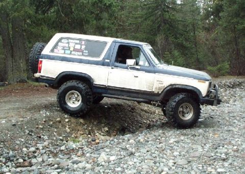 1982 Ford Bronco - This 1982 Ford Bronco is shown navigating a challenging, rocky terrain.