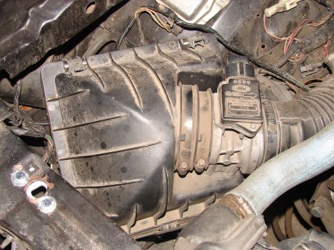 1973 Ford Ranchero - Close-up of a Ford air intake system, showing the air flow sensor and housing.