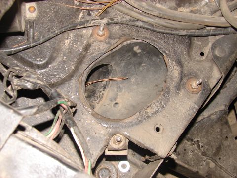 1973 Ford Ranchero - Close-up view of an engine bay component, showing wiring and a circular opening.