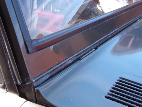 1975 Ford Bronco - The last big rain leak is this hinge. Water drips onto the pedals, and although all this RightStuff has slowed it down, it's not stopped. S…