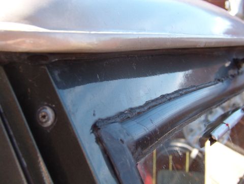 1975 Ford Bronco - The last big rain leak is this hinge. Water drips onto the pedals, and although all this RightStuff has slowed it down, it's not stopped. S…
