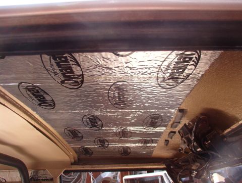 1975 Ford Bronco - The Dynamat above the front headliner hasn't sagged a bit in the past ~year. The foam strips near the wiper are to hold the headliner tight…