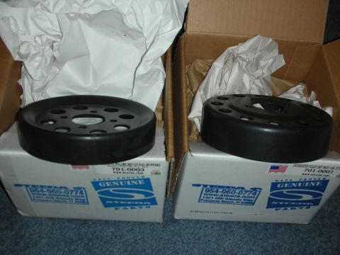 1998 Ford Crown Victoria - Two Steeda branded automotive parts are shown in their original packaging.