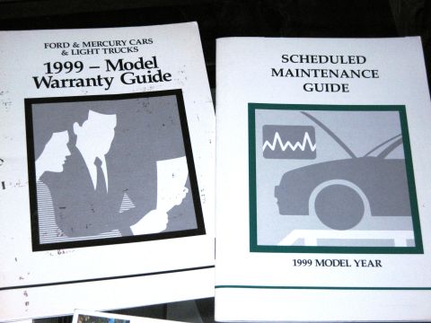 1986 Ford Bronco - Two automotive manuals are shown, one detailing warranty information and the other scheduled maintenance for 1999 models.