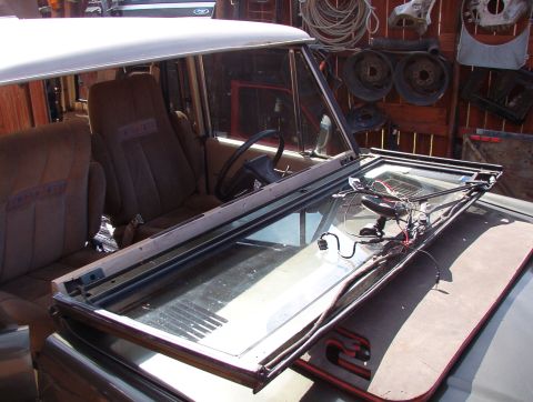1975 Ford Bronco - Even without the wiper motor, it's pretty heavy. I should have removed the wiper arms & set a board on the pad for the shafts.