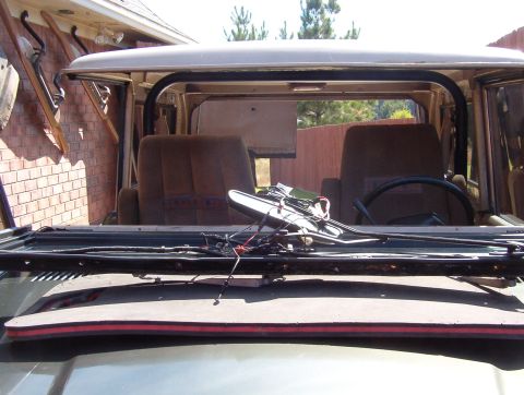 1975 Ford Bronco - Even without the wiper motor, it's pretty heavy. I should have removed the wiper arms & set a board on the pad for the shafts