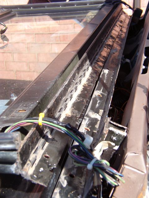 1975 Ford Bronco - After removing the dash & suspending it from the roof, I unbolted the hinge and shifted the frame forward enough to clean all this dirt out…