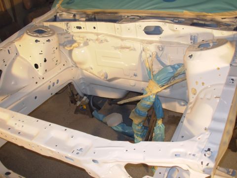 1995 Ford Taurus - Car engine bay stripped down and prepped for paint during a restoration project.