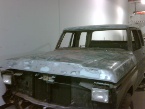 1979 Ford F-250 - Front view of a 1979 Ford F-250 crew cab truck in the process of restoration.