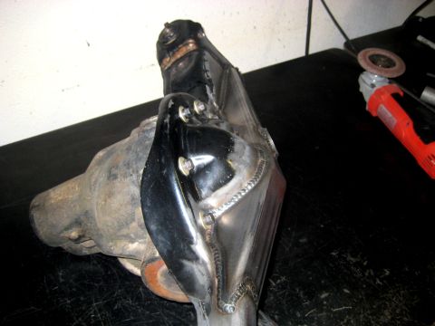 1996 Ford Bronco - Custom fabricated differential housing with visible welding and mounting hardware.