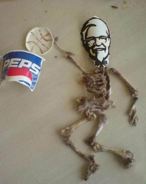 2006 Ford E350 - A humorous arrangement a skeleton, a cutout of Colonel Sanders, and a Pepsi cup.